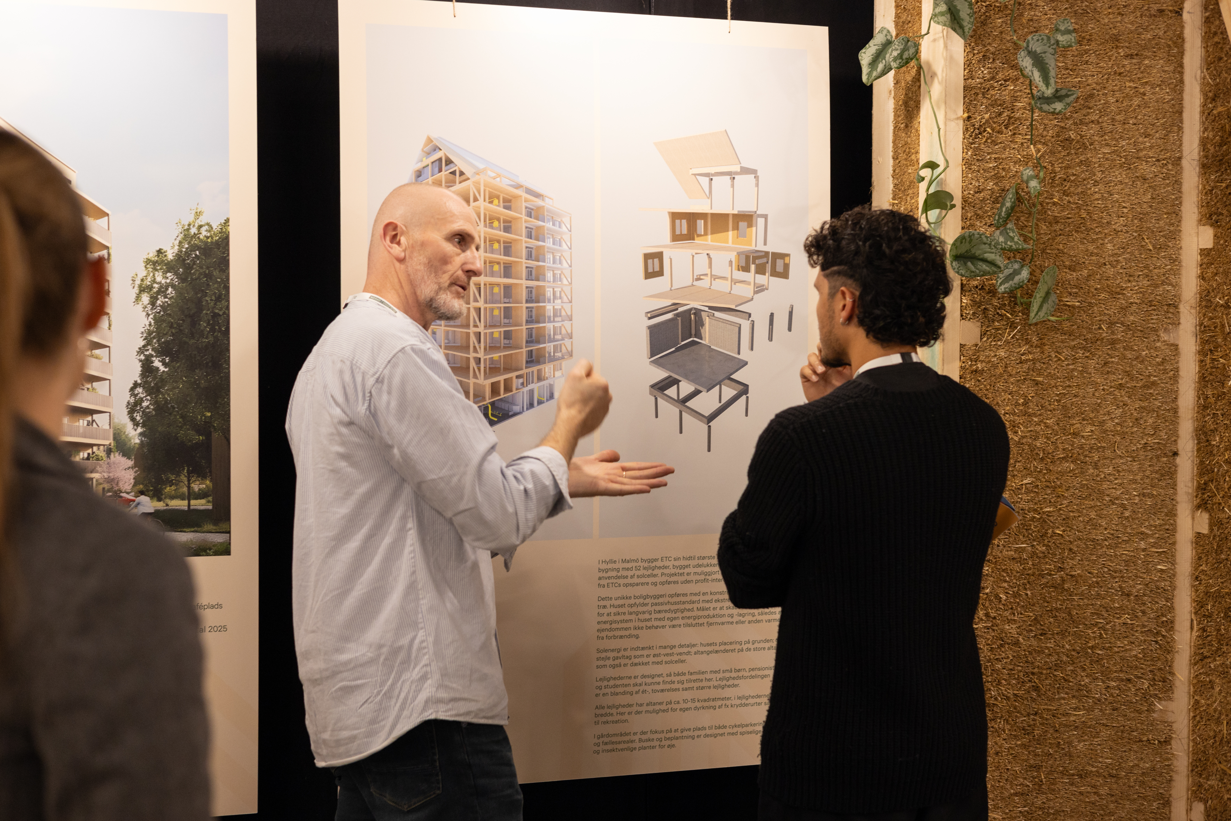 Technical consultation with architects reviewing building plans